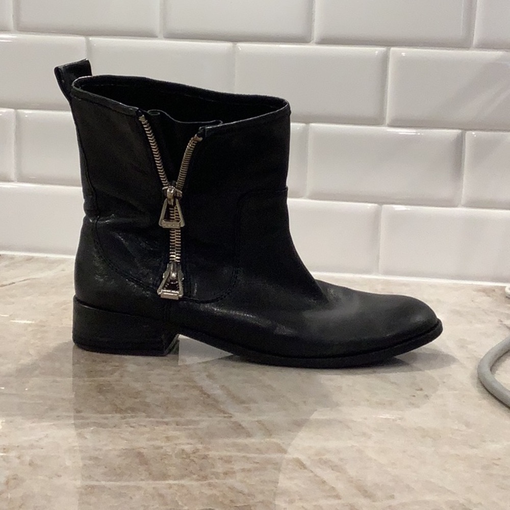 Antonio Melani black leather boots with gold zip side accents.  Ladies size 9.5